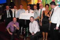 Sinead & Sean O'Hagan and Fergal Higgins presented with cheque from BCSC
